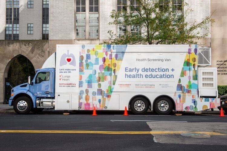 The photo shows a picture of the Health Screening Van.